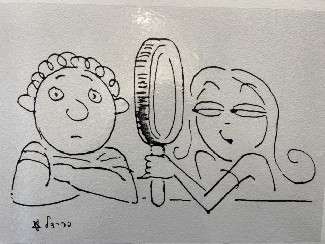 קריקטורה של פרידל בכניסה לשירותים במוזיאון הקריקטורה והקומיקס בחולון